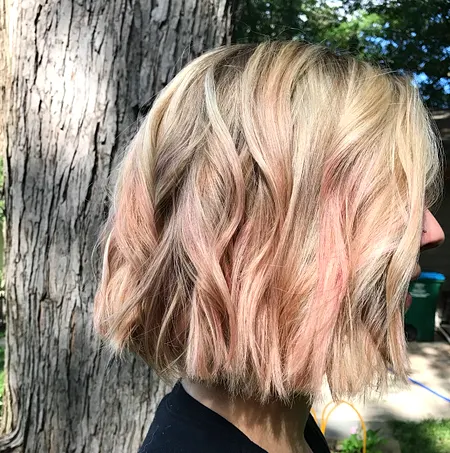 Blonde bob with pink tones